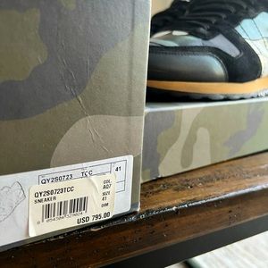 Valentino Garavani Camouflage Rockrunner fabric and nappa leather sneaker.